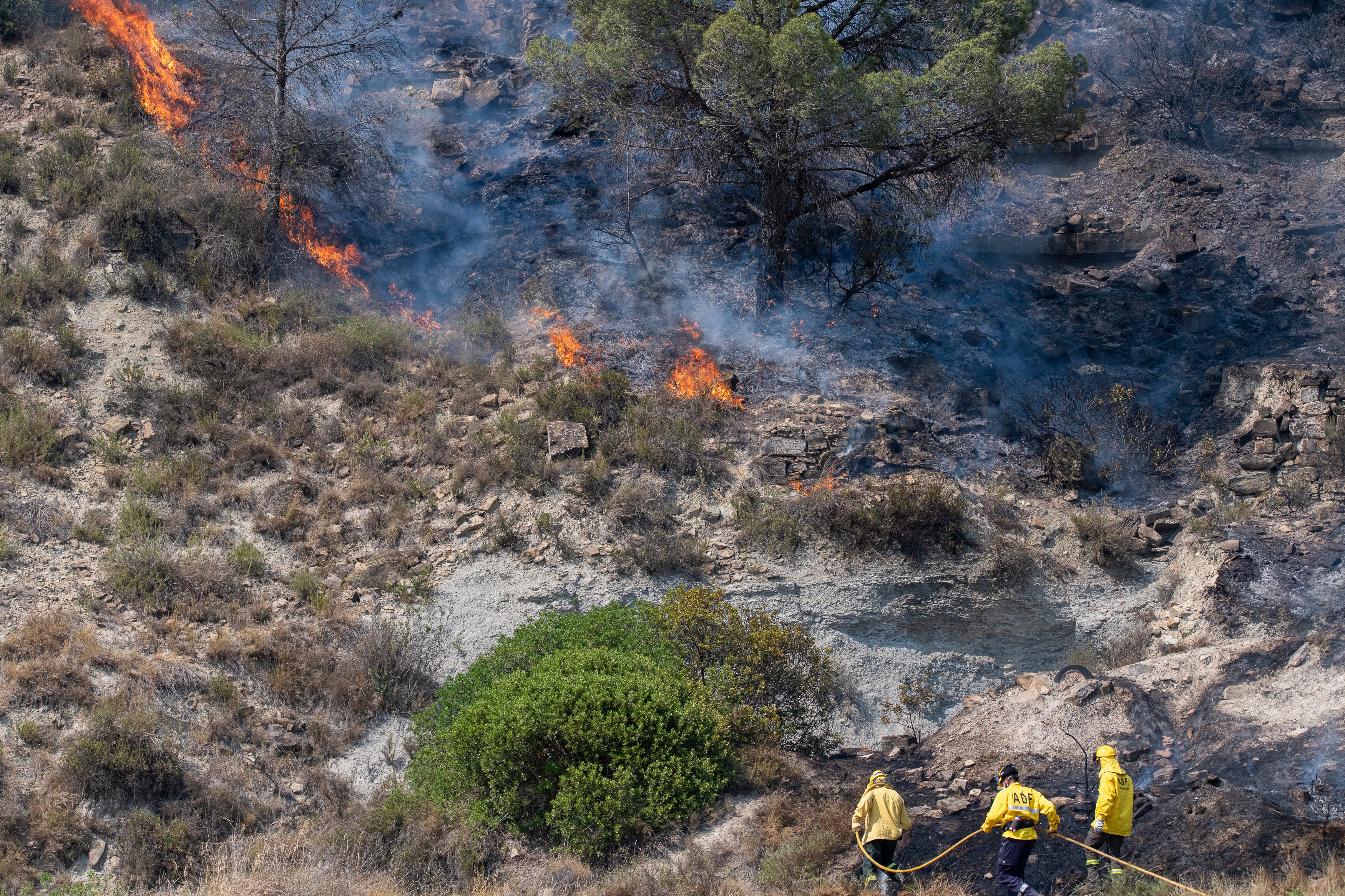 Vegetable area with fire affected by a new fire near the old landfill of Pont de Vilomara, on July 18, 2022, Barcelona, Catalonia (Spain). (Photo: Europa Press, AP)