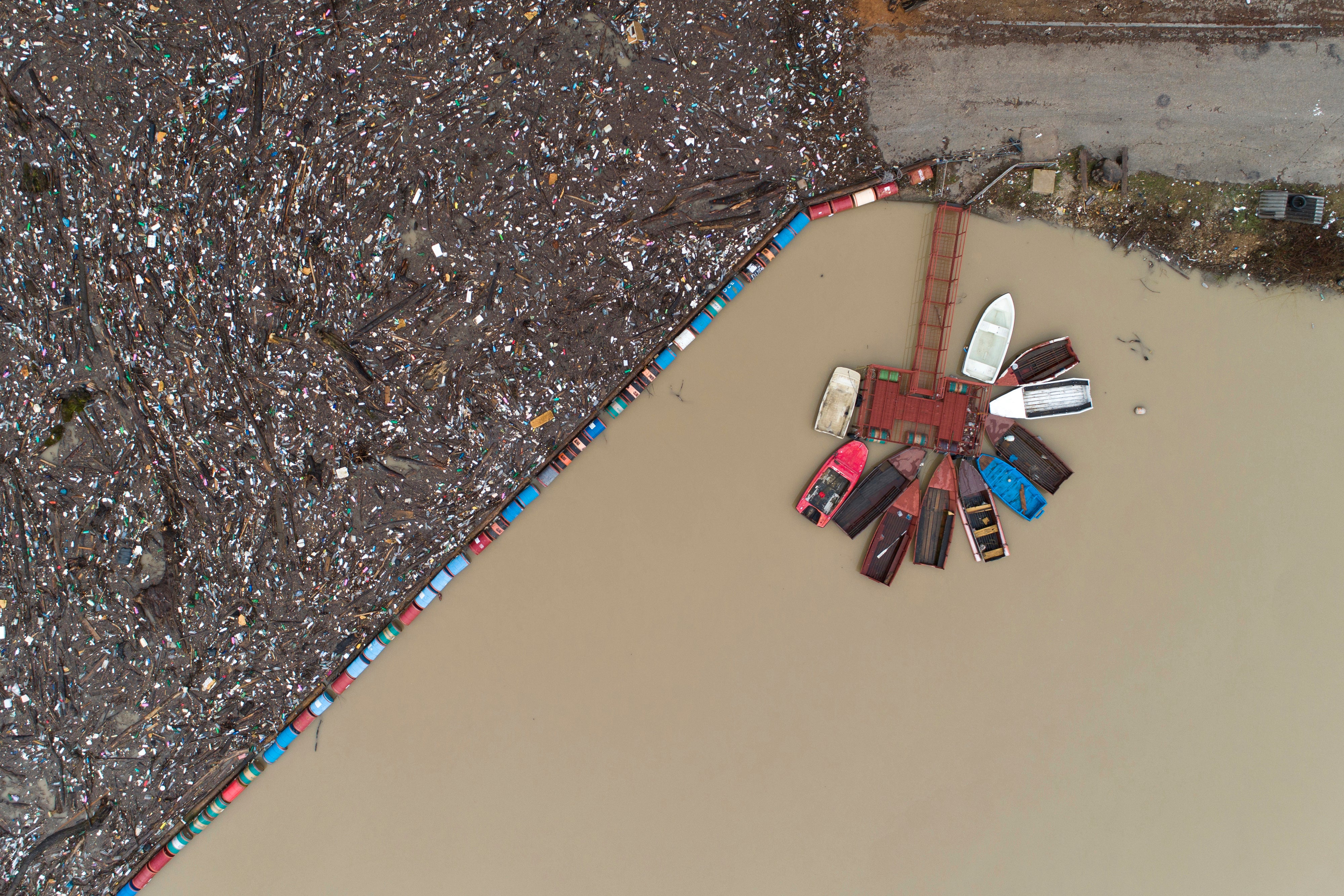 A small dock next to the trash heap.  (Photo: Armin Durgut, AP)
