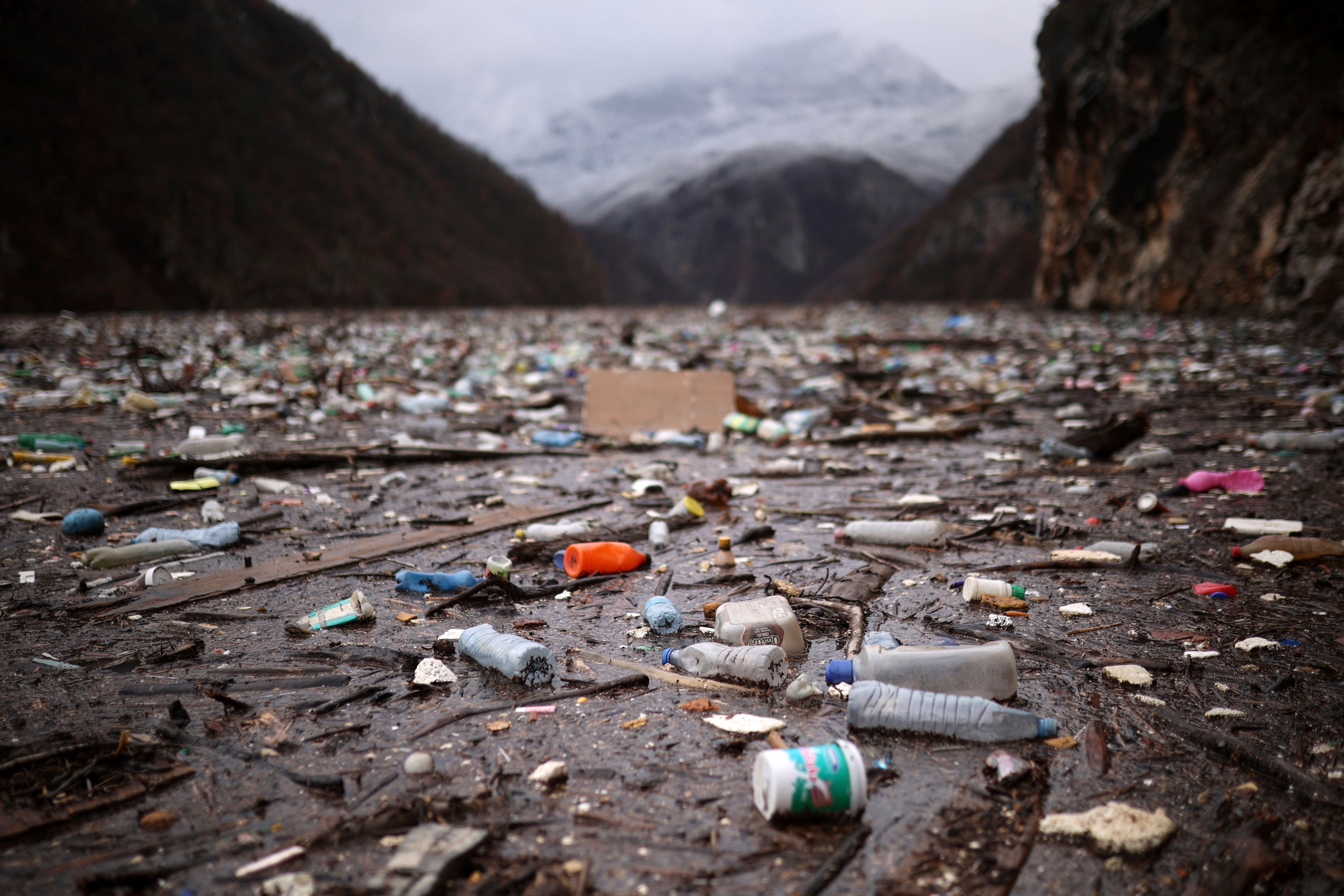 Bottles and other plastic paraphernalia lie in the trash heap. (Photo: Armin Durgut, AP)