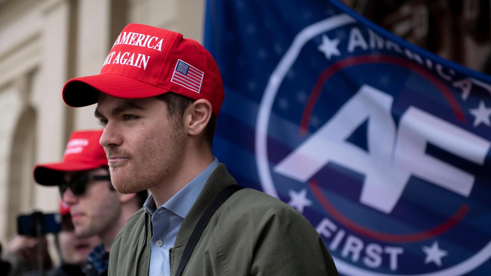 The 24-year-old white supremacist Nick Fuentes has been at the centre of multiple far right campaigns, including multiple stop the steal rallies. His online fan group have executed multiple digital harassment campaigns against critics. (Photo: Nicole Hester/Ann Arbor News, AP)