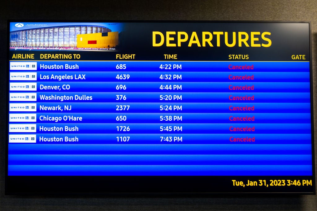 Flight information is displayed at the Austin-Bergstrom International Airport on January 31, 2023 in Austin, Texas. Many flights have been delayed and cancelled due to a winter storm passing through portions of Texas.  (Photo: Brandon Bell, Getty Images)