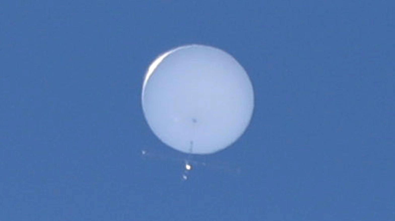 A photo of a giant white balloon flying over Japan 2020. (Photo: Kaname Muto, AP)