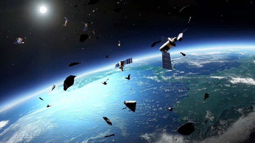 Artist's impression of space junk orbiting Earth. (Illustration: Mark Garlick/Science Photo Library, AP)