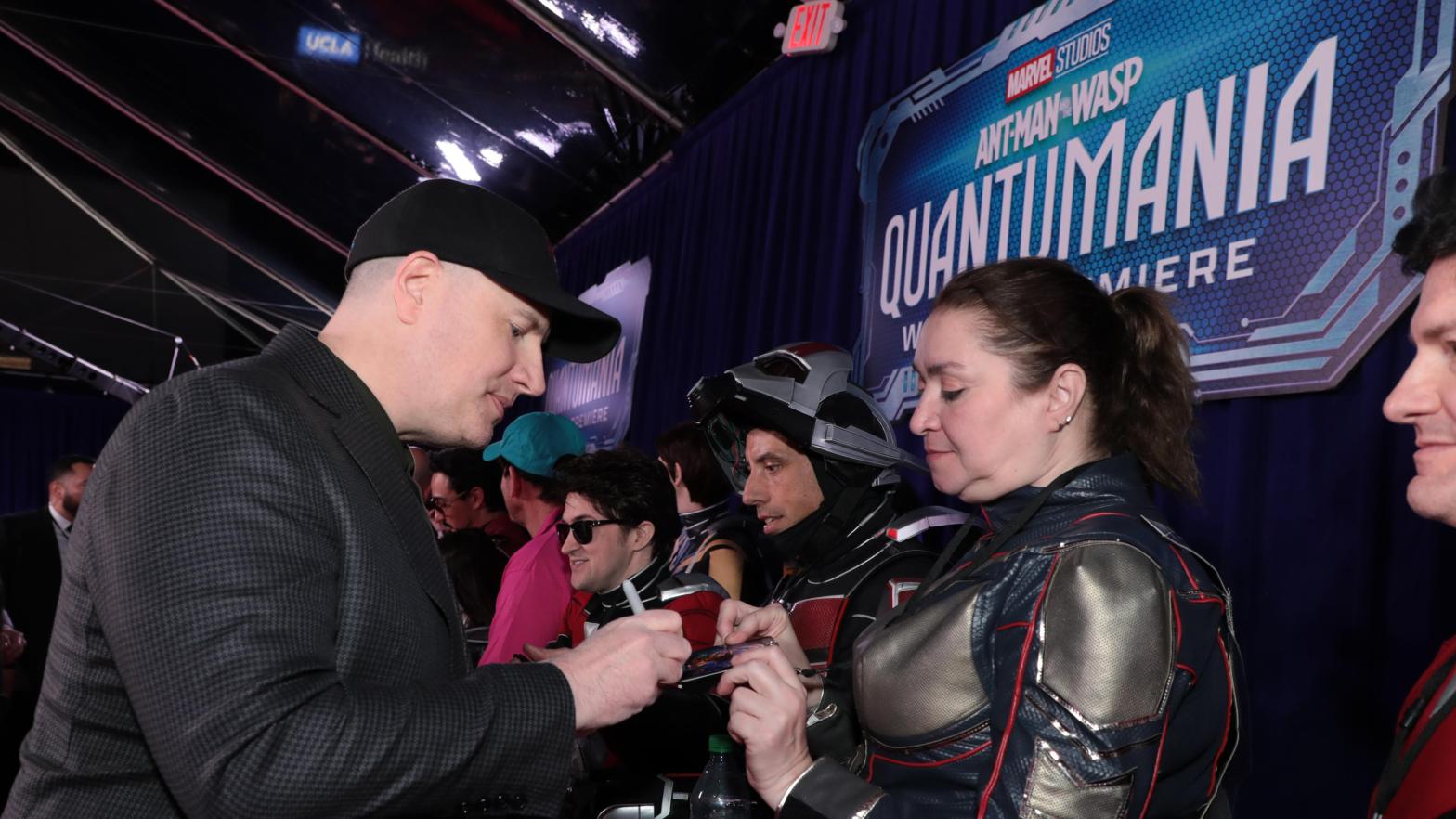Kevin Feige signing autographs at the Ant-Man 3 premiere. (Image: Alex J. Berliner/ABImages/Disney)
