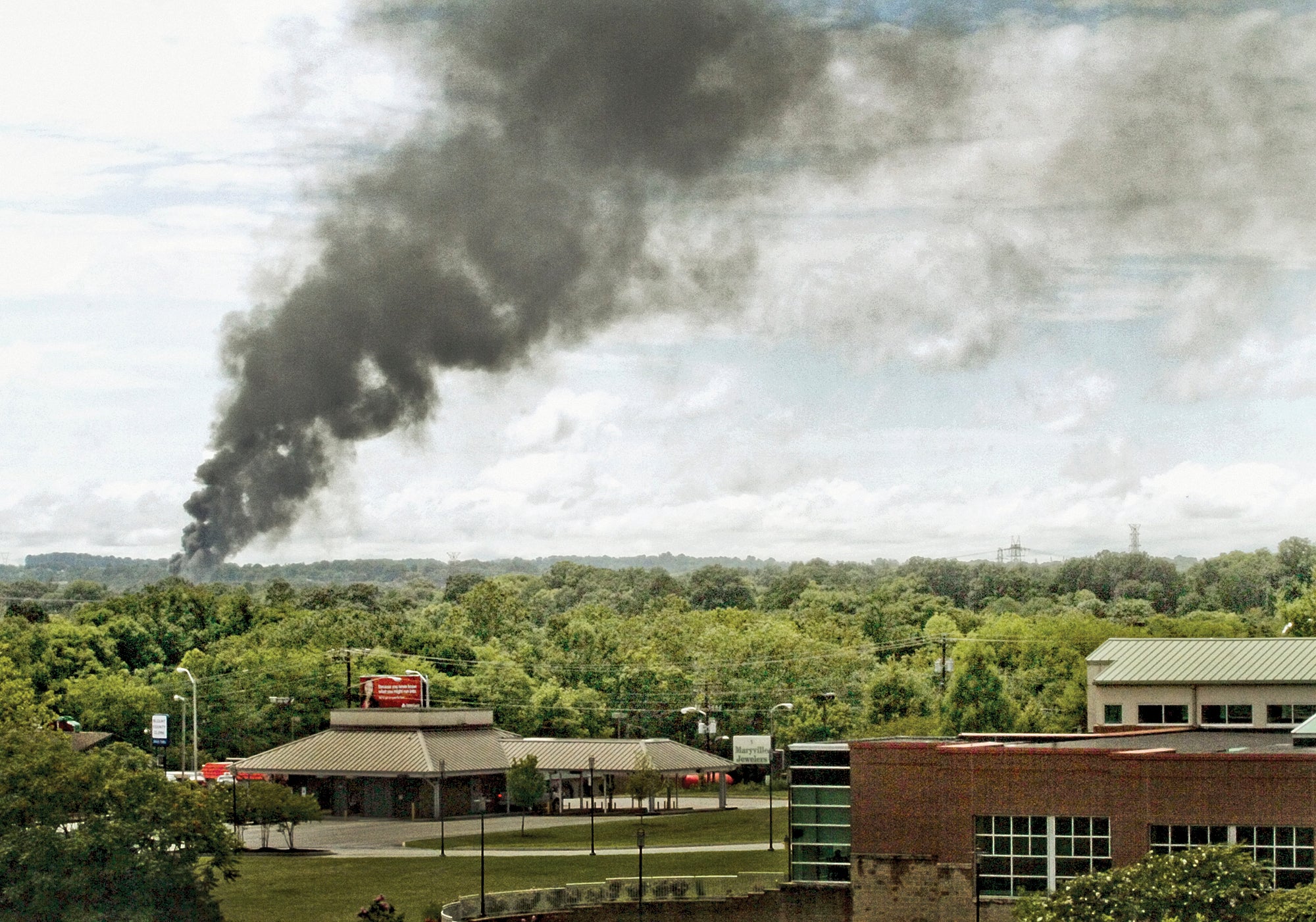 Smoke rises from the derailment site over Maryville on July 2, 2015. (Photo: Mark A Large/The Daily Times, AP)