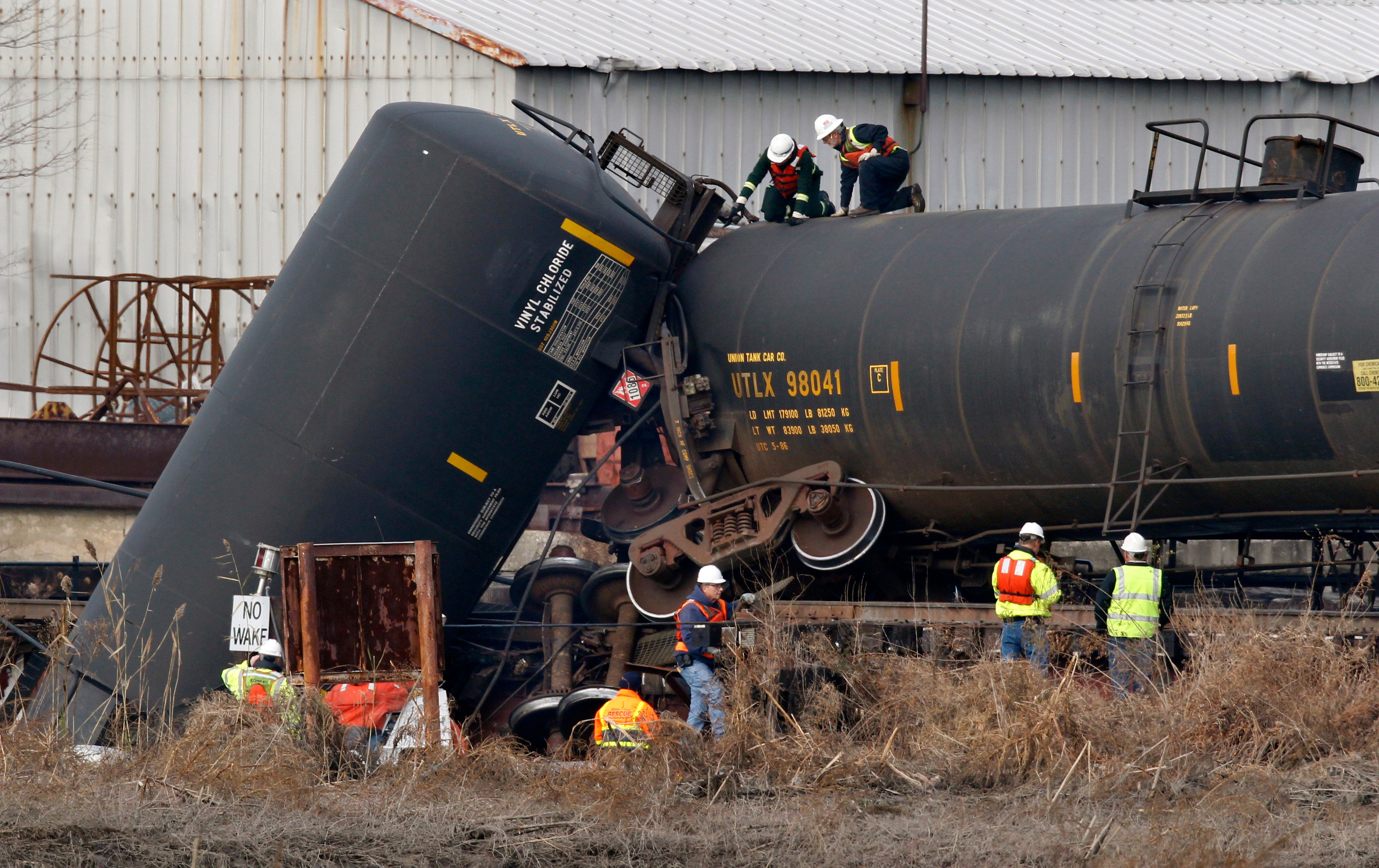 Officials examine a derailed car in Paulsboro on November 30, 2012. (Photo: Mel Evans, AP)