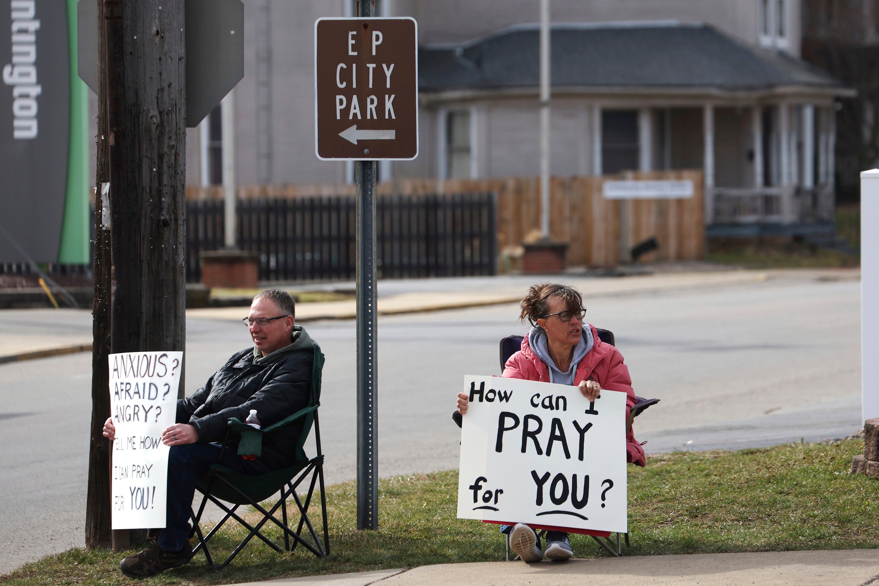Community members offer support 2 weeks after a train derailment containing toxic chemicals were released in East Palestine, Ohio. (Photo: mpi34/MediaPunch /IPX, AP)