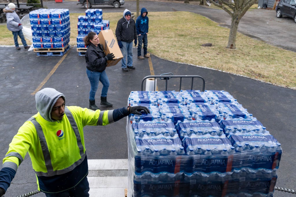 Dean Logan, a worker at Pepsi, delivers cases of water for volunteers to distribute to residents on February 17, 2023 in East Palestine, Ohio.  (Photo: Michael Swensen, Getty Images)