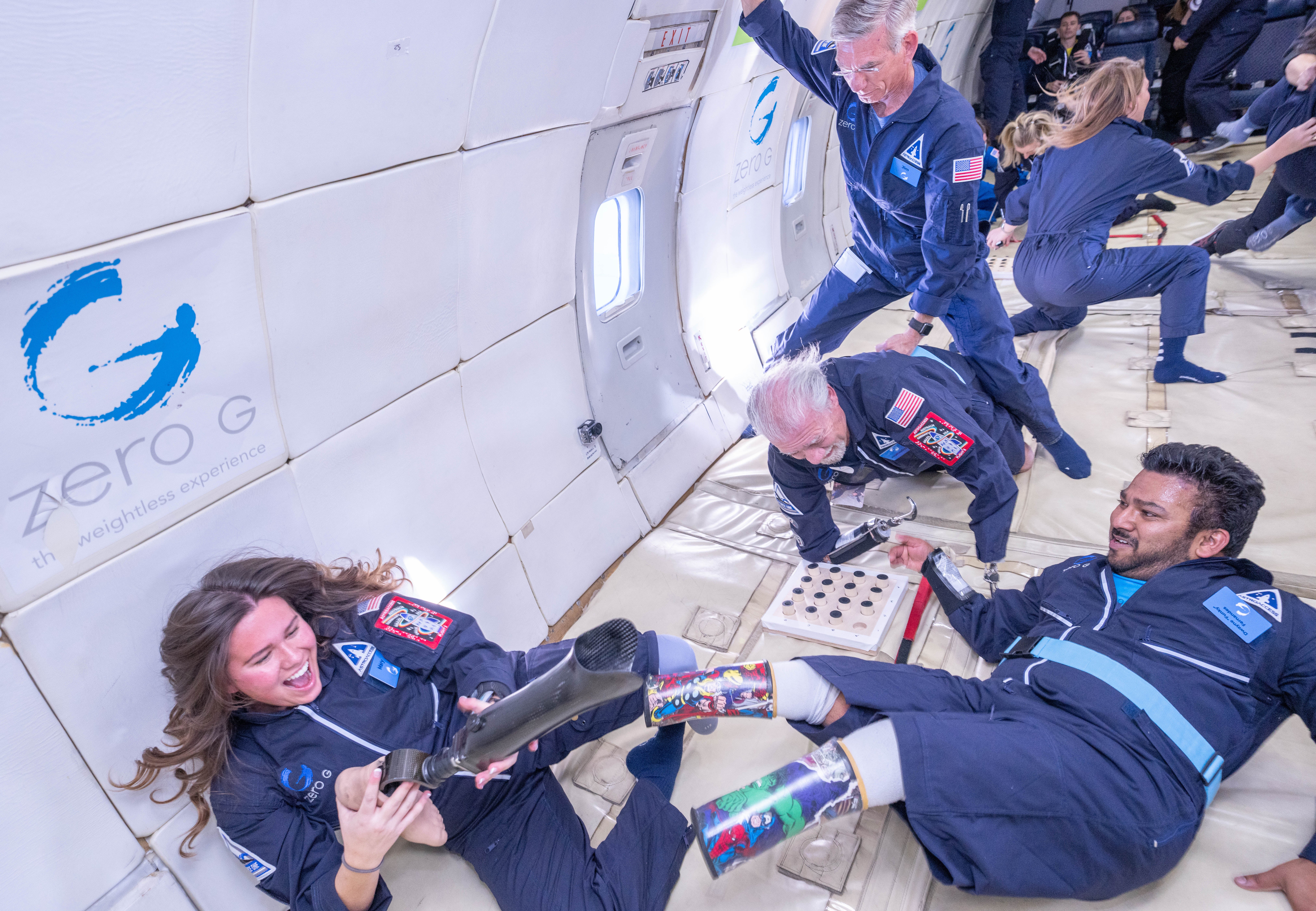 Fernandes (bottom right) during the recent AstroAccess parabolic flight.  (Photo: Tasha Dixon)