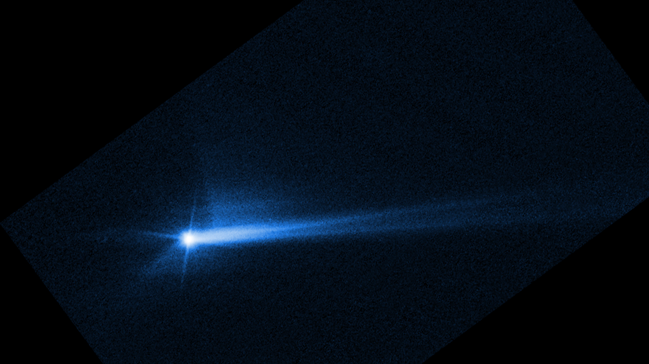 Hubble image taken on September 26, 2022, shows a discernable tail emanating from the Didymos-Dimorphos system as a result of the impact.  (Image: NASA/ESA/STScI/Hubble)
