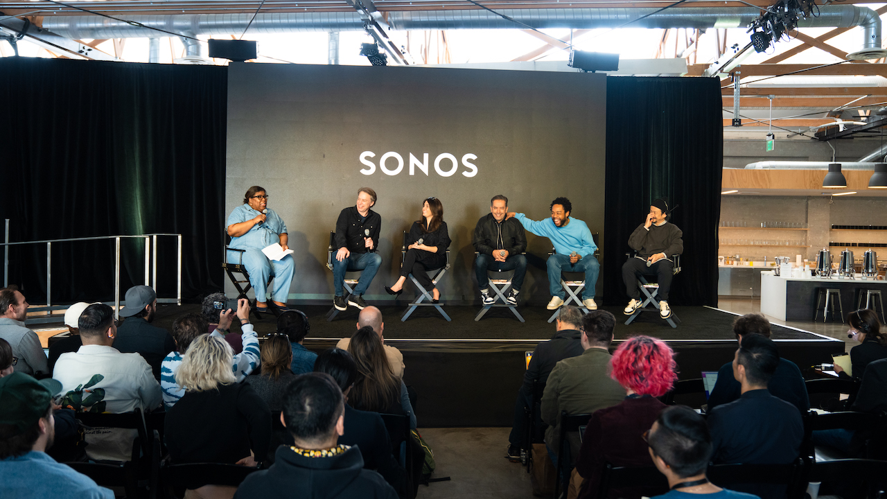 Six people sitting on a stage at the Sonos Era 300 launch