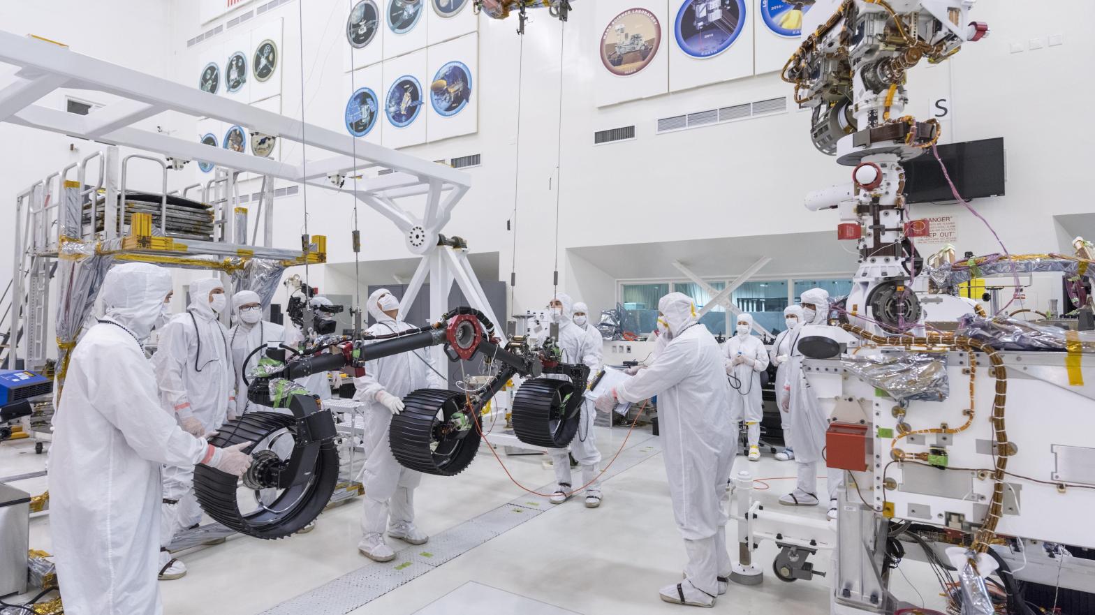 NASA's Perseverance rover being outfitted with its wheels at JPL on June 13, 2019. (Photo: NASA/JPL-Caltech)