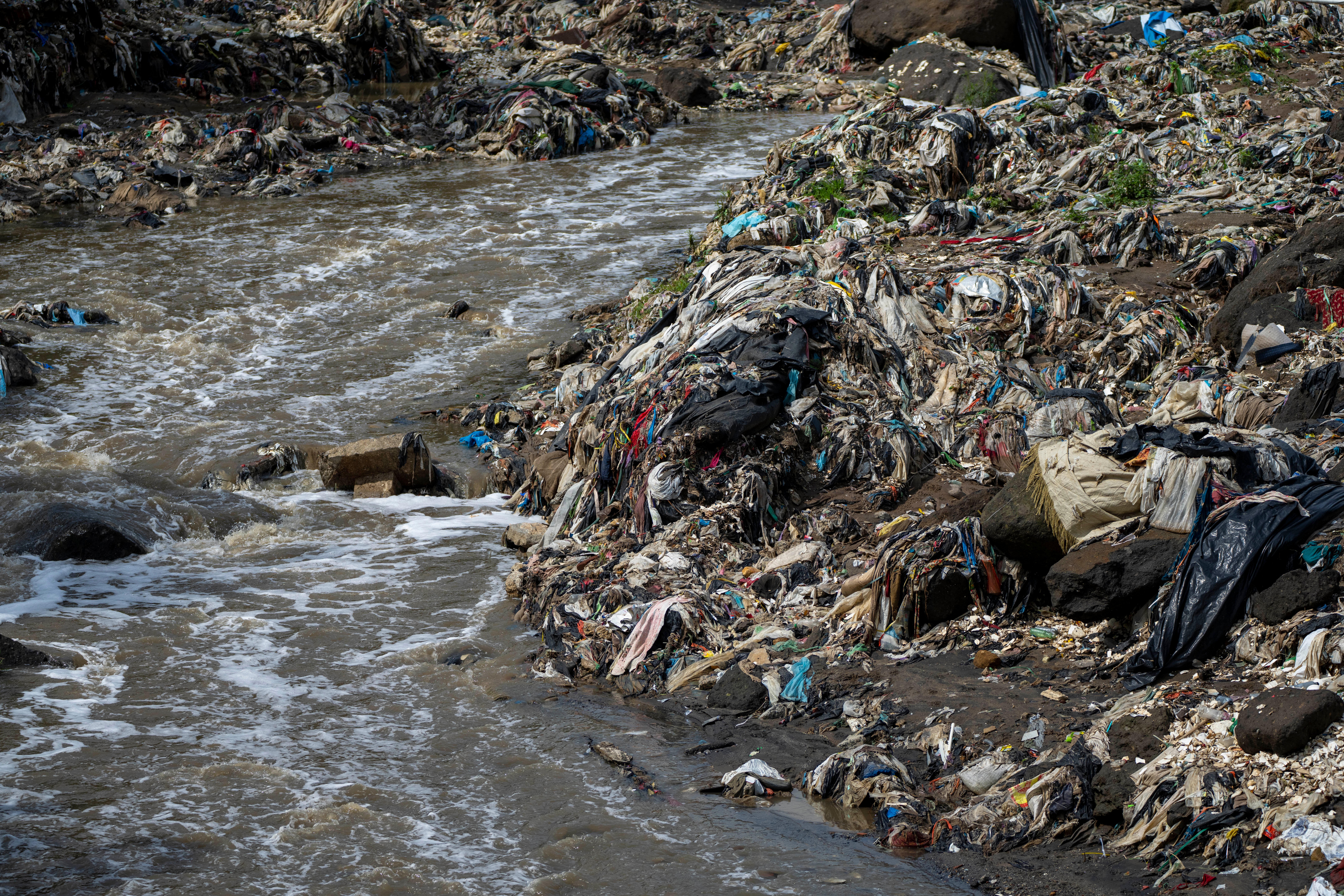 Trash in a river on the outskirts of Guatemala City. Plastic that ends up in the ocean often starts by being dumped inland, where rivers feed it into the sea.  (Photo: Moises Castillo, AP)