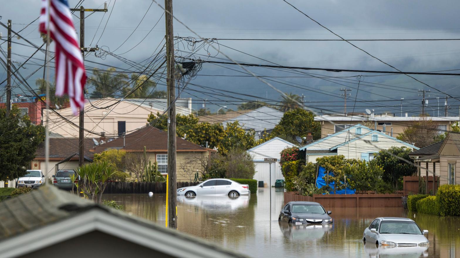 Cars sit partially submerged in floodwaters in Watsonville, Calif., Saturday, March 11, 2023. (Photo: Nic Coury, AP)
