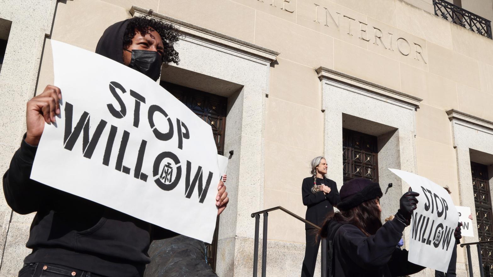 Activists protest outside the Interior Department in November.  (Photo: Jemal Countess, Getty Images)