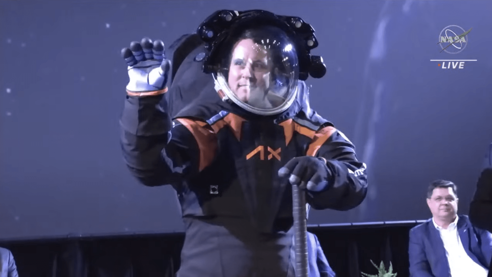Axiom engineer Jim Stein modelled the spacesuit on stage during the live event.  (Screenshot: NASA TV)