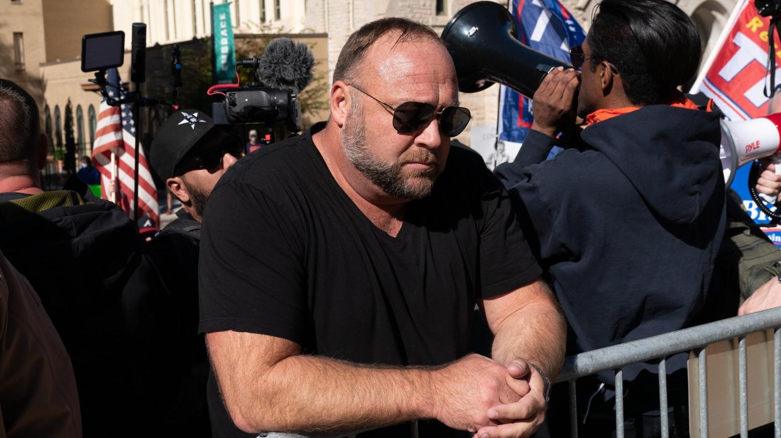 Alex Jones has a large media empire including a podcast and online store, but he also has some other side projects he himself claimed ownership for. (Photo: Elijah Nouvelage, Getty Images)