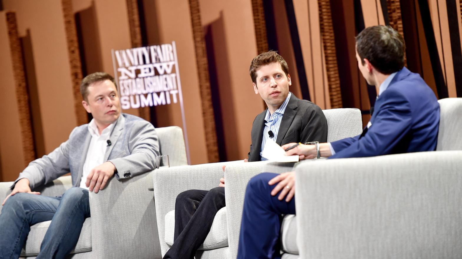Elon Musk, left, and Sam Altman, middle, were once co-chairs for OpenAI, though Musk left in 2018. Though the company said it was due to conflicts of interest, a new report claims that it was much more personal. (Photo: Mike Windle, Getty Images)