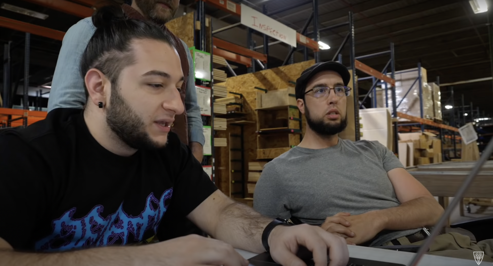 In a screenshot from a Wyrm Lyfe video, Bobby Downey (L) and Doug Costello read comments on a Wyrm Lyfe video. (Screenshot: Wyrmwood)