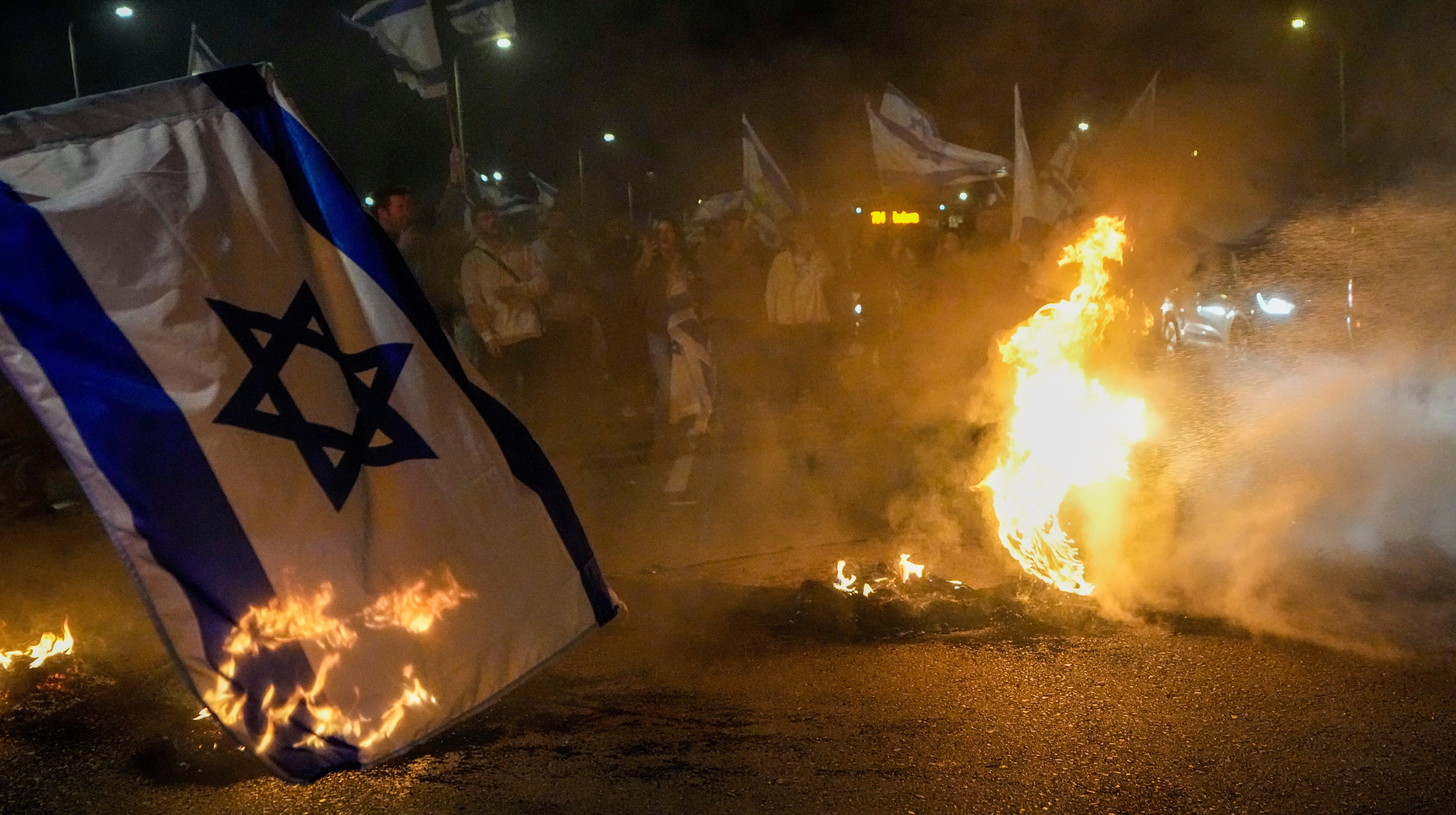 Anti-government protestors took to the streets in Beit Yanai, Israel to oppose Prime Minister Benjamin Netanyahu's judicial overhaul plan. (Photo: Ariel Schalit, AP)