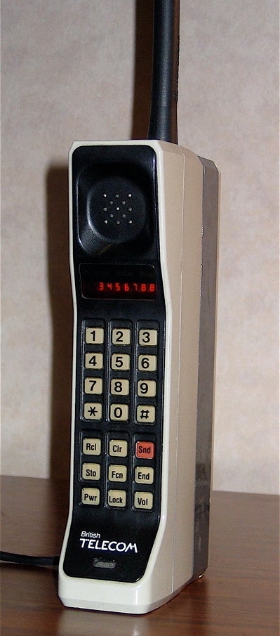 1980s Bag phone .. Car phone .. Mobile phone. What a dinosaur. - This was  our first cell phone! LoL!!