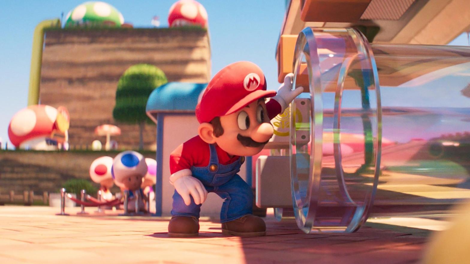 Mario looking in a pipe. (Image: Universal)
