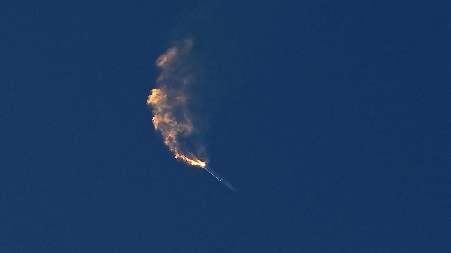 The rocket's different stages failed to separate, causing it to flip around before exploding in the skies.  (Photo: Eric Gay, AP)