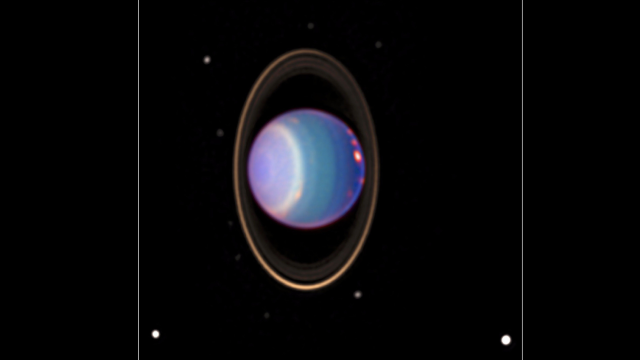 Four Moons Circling Uranus May Be Sopping Wet