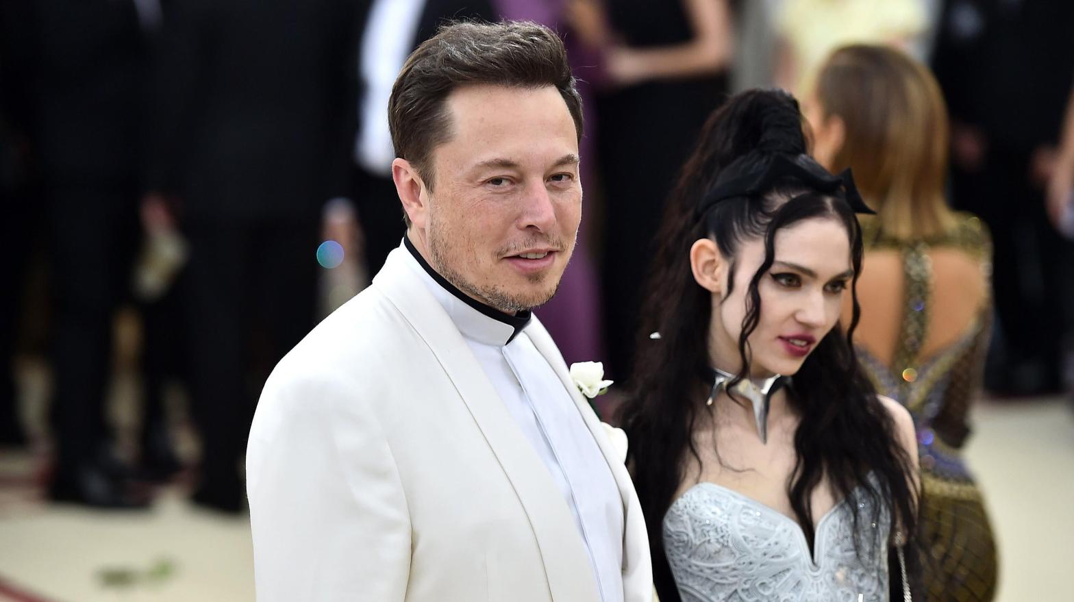 Grimes with former boyfriend and OpenAI funder Elon Musk.  (Photo: Theo Wargo, Getty Images)