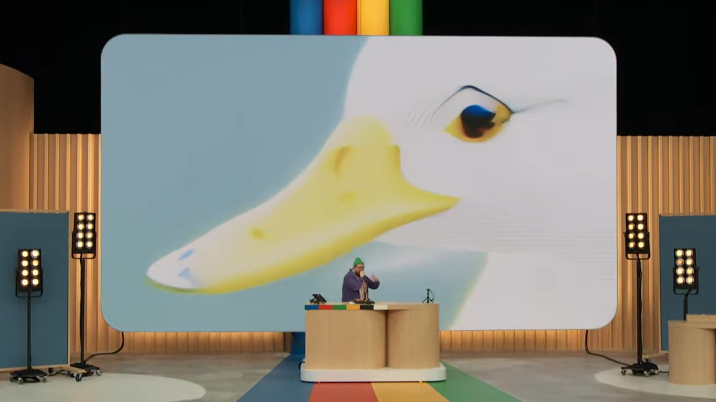 Music artist Dan Deacon constantly joked about a 'duck with lips' before the start of Google I/O 2023. His performance included AI-generated content from Google's new text-to-video models. (Screenshot: Google / Gizmodo)
