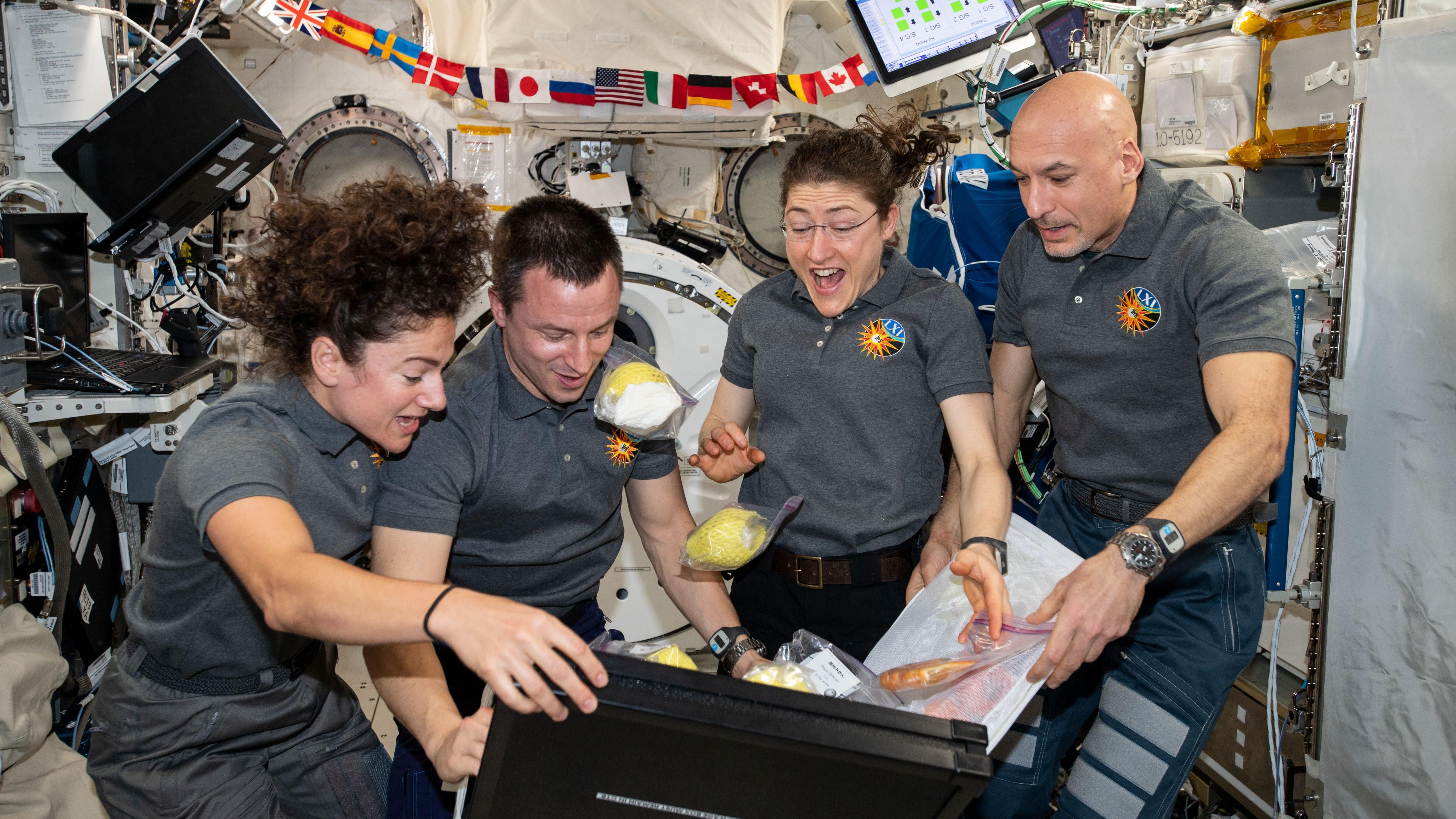 ISS astronauts unpacking newly delivered food, October 2019.  (Photo: NASA)