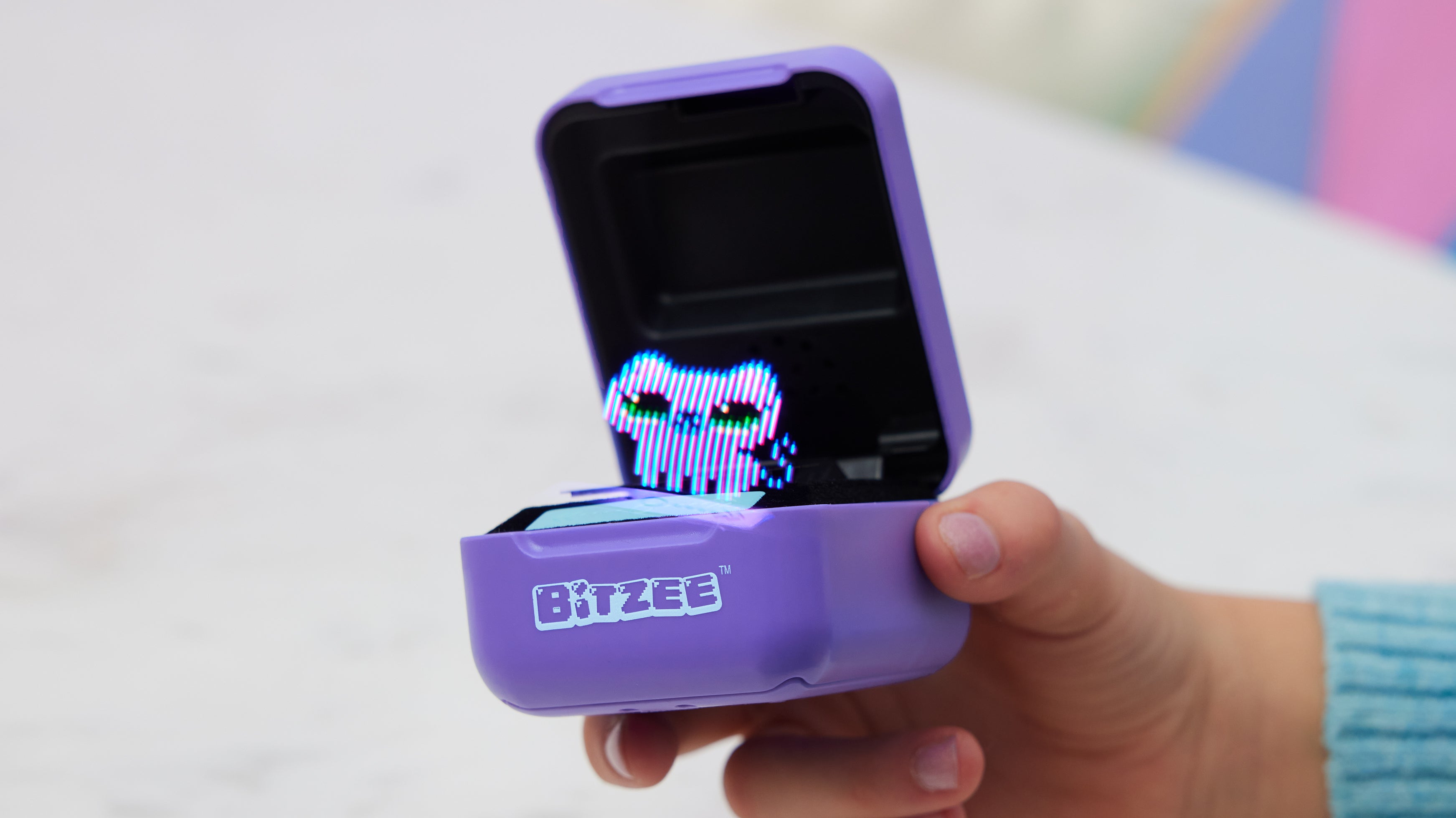 Up to 15 Bitzee digital pets can be unlocked on each device, with extras like games unlocked as they evolve. (Image: Spin Master)