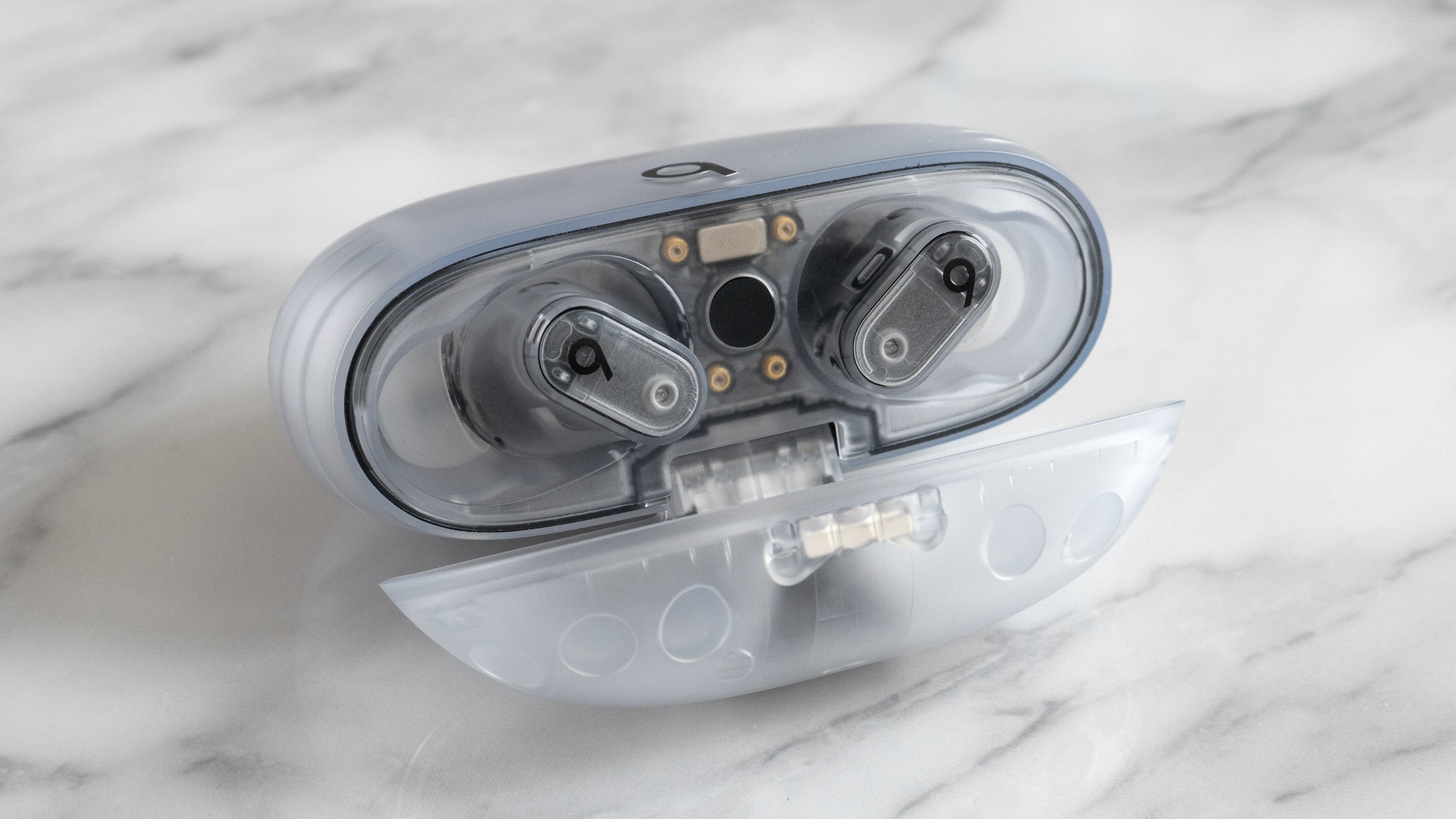 In addition to black/gold and ivory colorways, the Beats Studio Buds + also come in a transparent housing with a frosted white finish. (Photo: Andrew Liszewski | Gizmodo)