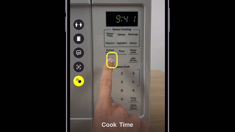Apple showed how users could use the upcoming Point and Speak feature in the Magnifier app to detect and read buttons on a microwave. (Gif: Apple / Gizmodo)