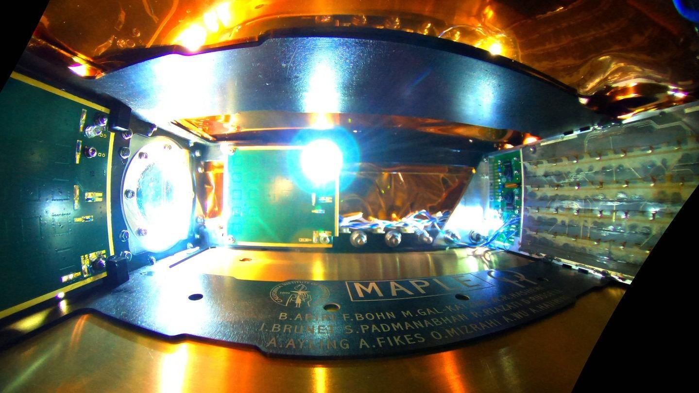 The inside of the space-based Microwave Array for Power-transfer Low-orbit Experiment (MAPLE) which emits collected energy across empty space using an array of transmitters (right) to two receivers (right) to illuminate an LED. (Image: Caltech)