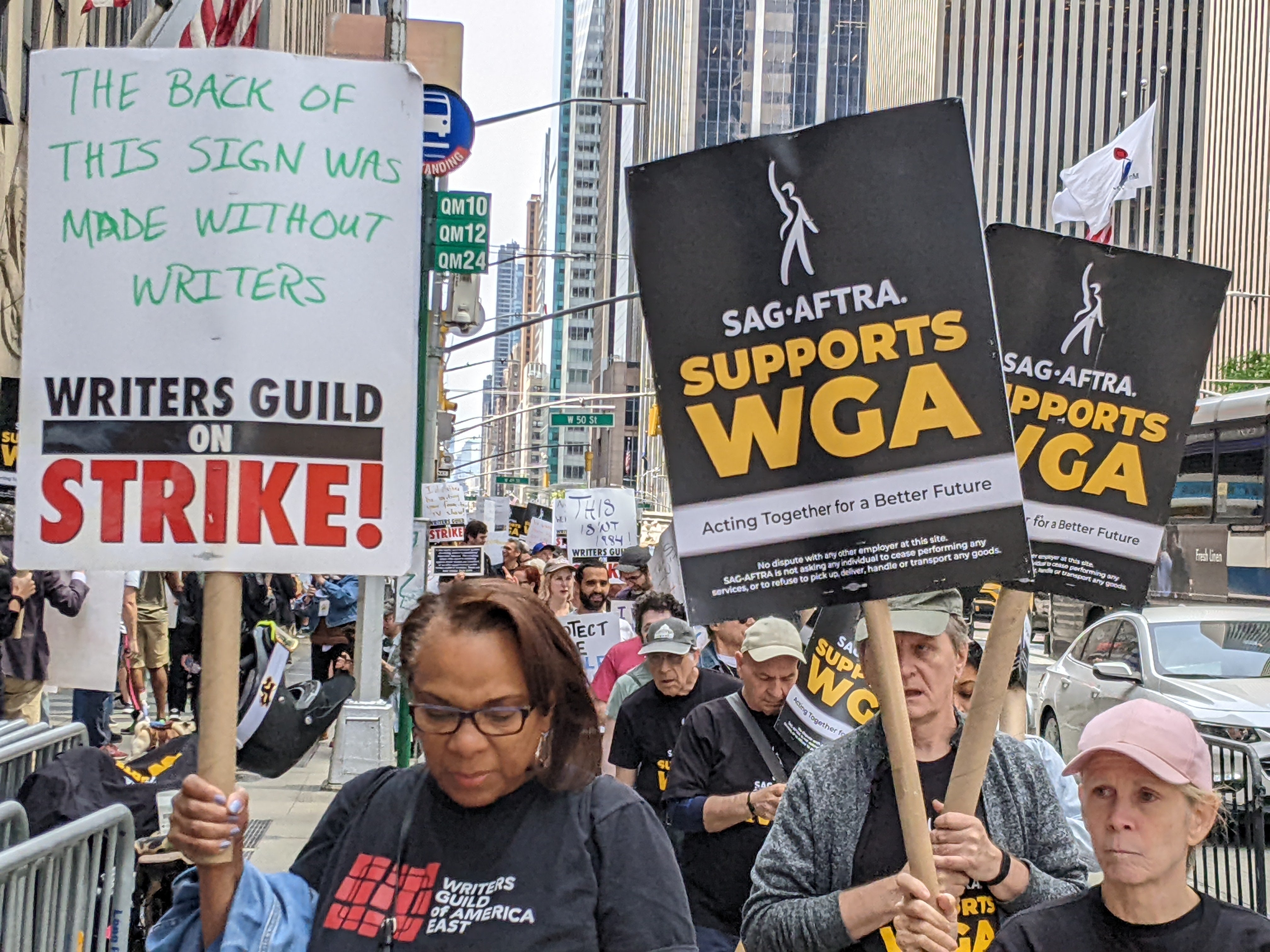 SAG-AFTRA members picketed outside of Radio City Music Hall in Manhattan in May to support the WGA in their ongoing strike. SAG-AFTRA has also come out strongly against companies using AI to replace actors. (Photo: Kyle Barr / Gizmodo)