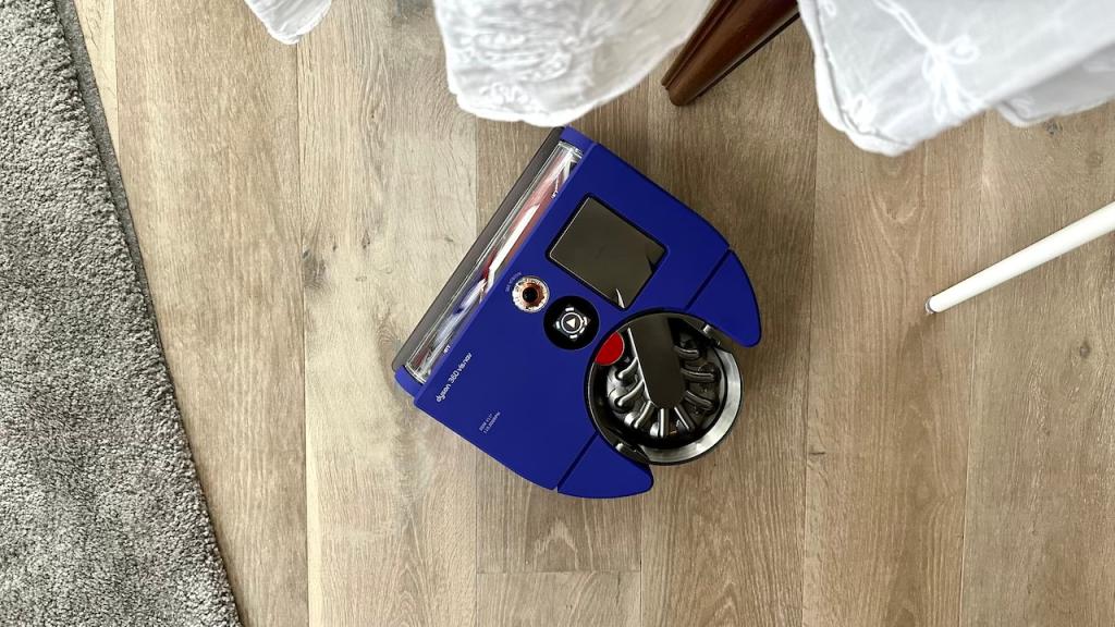 Dyson 360 Vis Nav next to a table