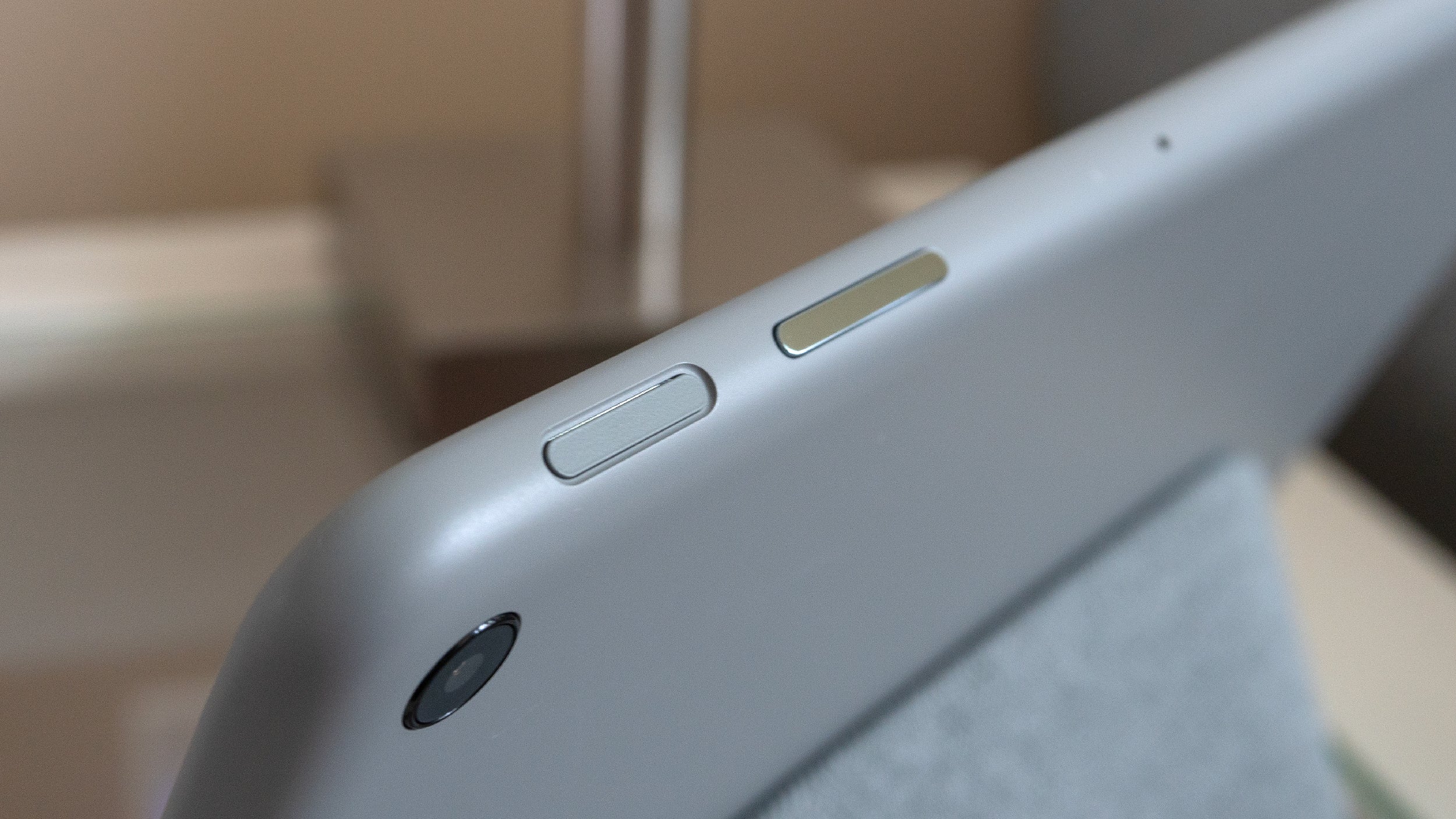The lock/power button is located on the top edge of the Pixel Tablet (when using it in landscape mode) next to the volume rocker, and features an integrated fingerprint reader. (Photo: Andrew Liszewski | Gizmodo)