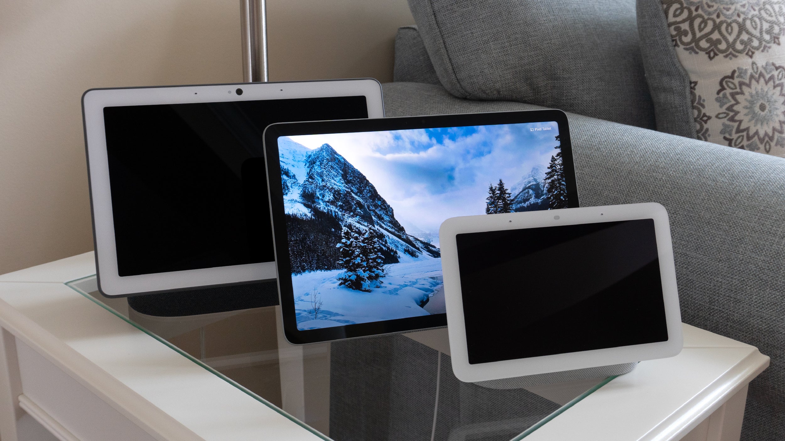 The Pixel Tablet (middle) feels roughly the same size as the Google Nest Hub Max (left) but much larger than the Google Nest Hub (right). (Photo: Andrew Liszewski | Gizmodo)
