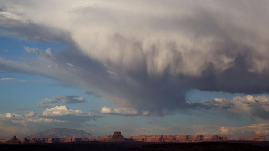 A rain cloud hangs over Lake Powell on June 24, 2021 in Page, Arizona. (Photo: Justin Sullivan, Getty Images)