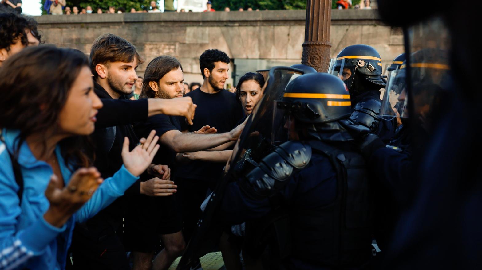 Protestors clash with police in Nanterre, France last week after the killing of Nahel Merzouk. (Image: Ameer Alhalbi, Getty Images)