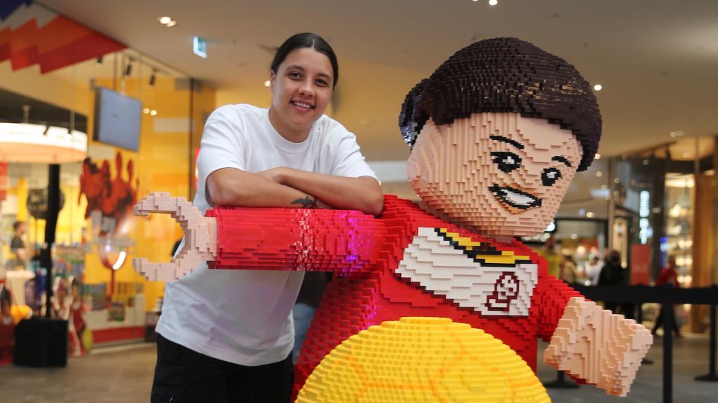 Sam Kerr with giant Lego mini figure of herself