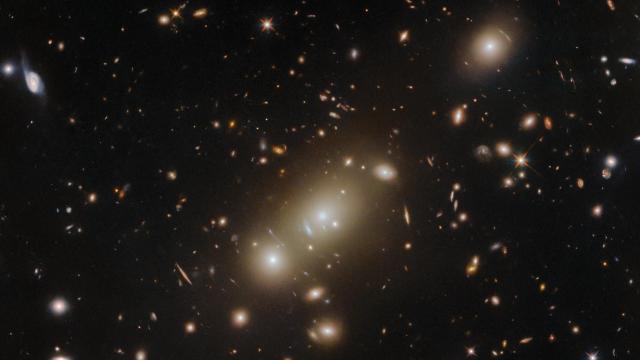 Hubble Space Telescope Snaps Galaxy Cluster That Could Hold Secrets of Dark Matter