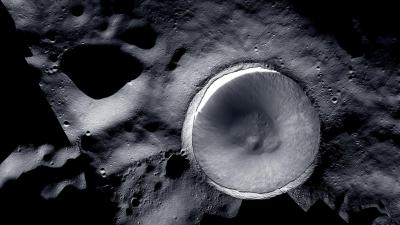 Orbiting Lunar Cameras Join Forces to Weave Beautiful Mosaic of Shadowed Moon Crater