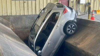 Someone Drove Their Car Into a Trash Compactor, For Some Reason