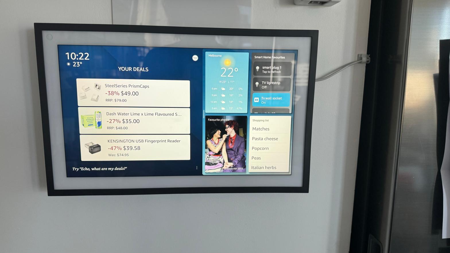 An Amazon Echo Show 15 with a lot going on on the screen, but mostly just ads