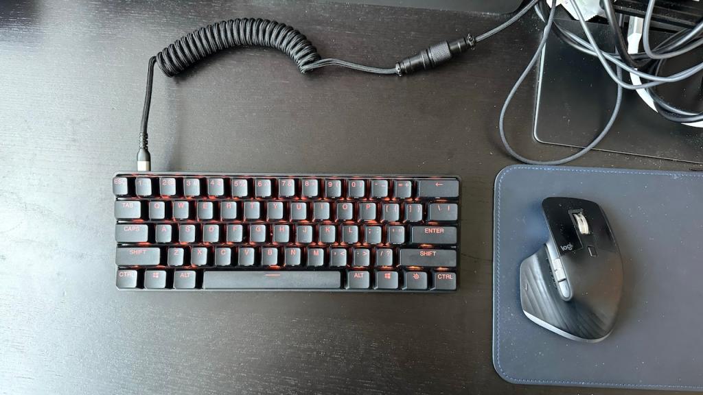 SteelSeries Apex 9 mini keyboard and mouse on a desk