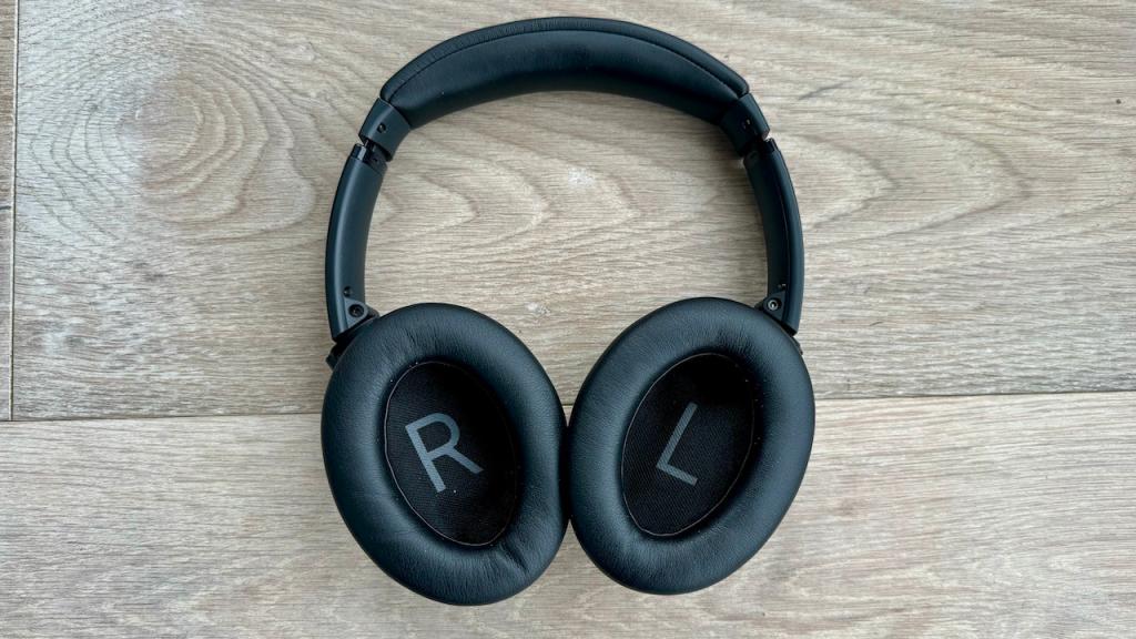 Bose QuietComfort headphones on a wooden floor