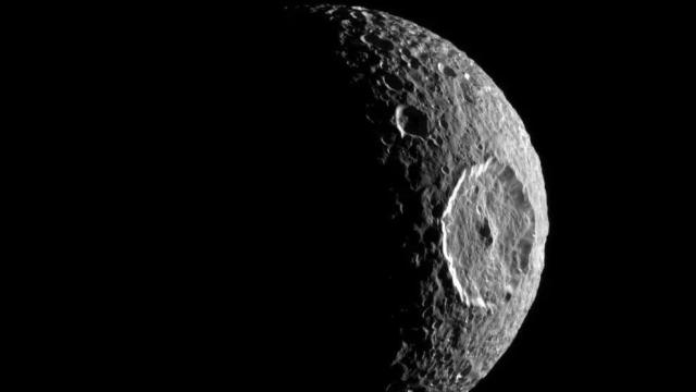 Saturn’s ‘Death Star’ Moon Is Hiding an Ocean Beneath Its Mangled Surface