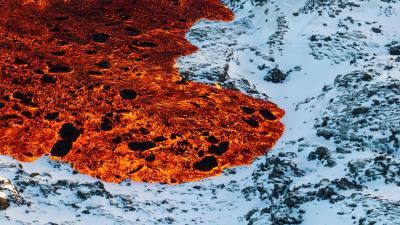Dramatic Iceland Eruption Photos Show Lava Spreading Across Pristine Snow